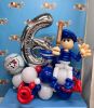 Picture of Custom Foil Number Birthday Balloon Arrangements with twisted Character